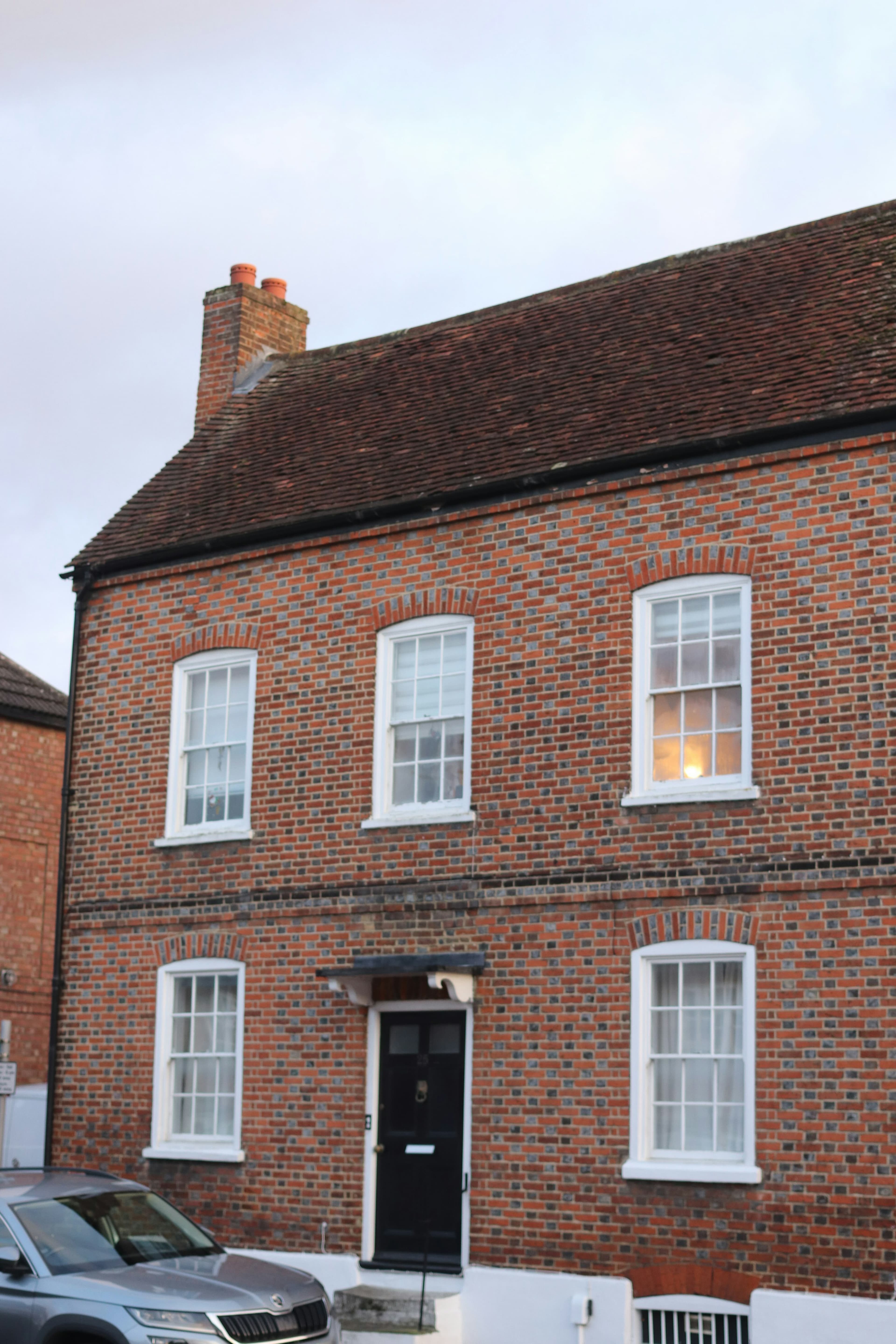 Brick house exterior used as the agency report cover image